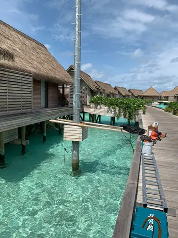 Network mast installed on an overwater villa jetty at Adaaran Select Hudhuranfushi